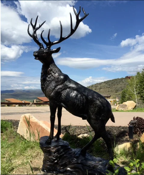 Elk on Stone Facing Left