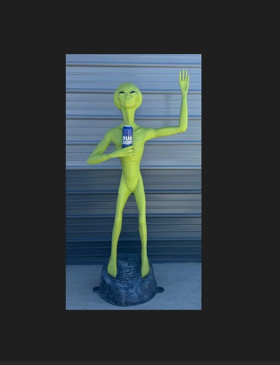 Green Alien Rising Hand with Can